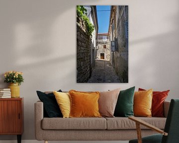 deserted alley in the historical old town of Krk by Heiko Kueverling