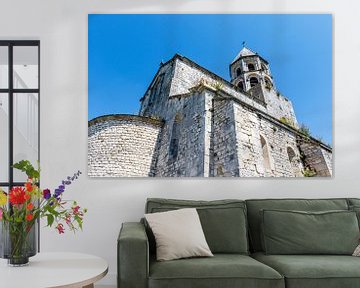 View of the Saint Michel church in the old town La Garde Adhemar in Drome, southern France