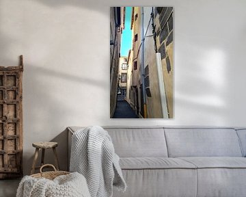 Narrow French street in ochre and blue sky by Ton van Waard - Pro-Moois