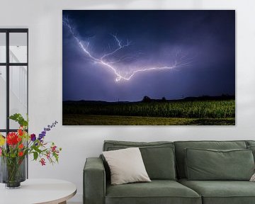 Nocturnal thunderstorm over a corn field by Menno van der Haven