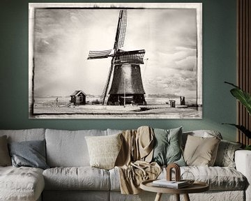 Hollandse windmolen in een winterlandschap van eric van der eijk