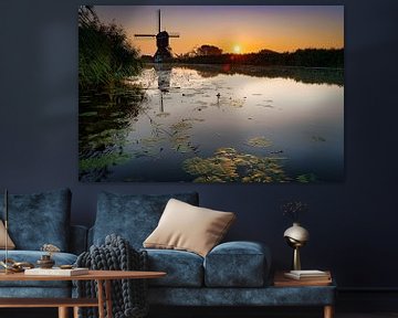 Mill by the water with lilies by Björn van den Berg