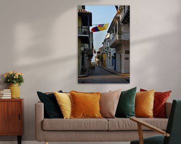 Street in Cartagena de Indias - Colombia flag waving by Carolina Reina