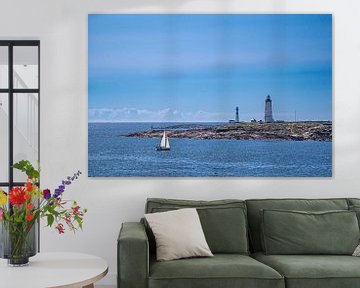 View from the island Merdø to lighthouses in front of the city Arendal in Norway by Rico Ködder