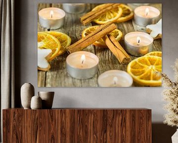 Burning Christmas and Advent candles with aromatic decoration by Alex Winter