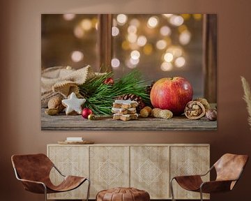 Red apple with christmas decoration on wood table by Alex Winter