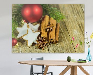 Christmas star cookies and spices on wooden table by Alex Winter