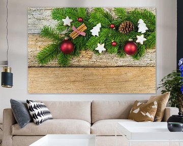 Rustic Christmas background with decorations and fir tree branch on wood, copy space by Alex Winter