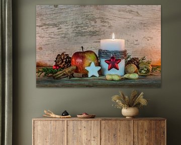 Advent and Christmas decoration with candle, ornament and food by Alex Winter