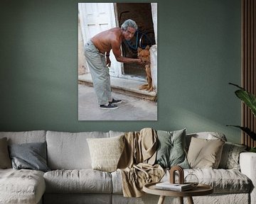 Cuban man with his dog