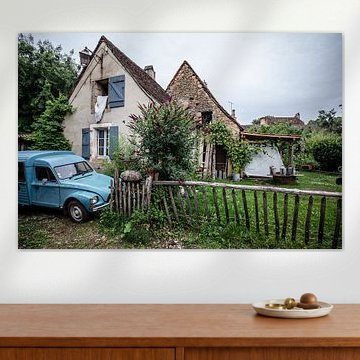 typical french house with old blue renault