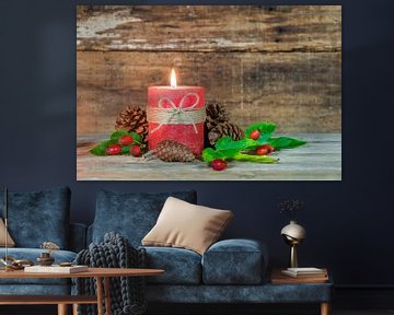 Autumn composition with burning candle flame, pine cones, red rose hips fruits by Alex Winter