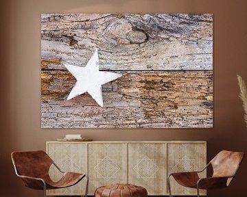 Christmas star decoration on old wooden background by Alex Winter