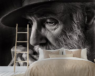 portret van een muzikant met mondharmonica van Hans Vos Fotografie