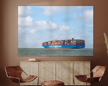 Container ship leaving the port of Rotterdam for the open North Sea by Sjoerd van der Wal