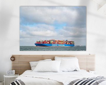 Container ship leaving the port of Rotterdam for the open North Sea by Sjoerd van der Wal