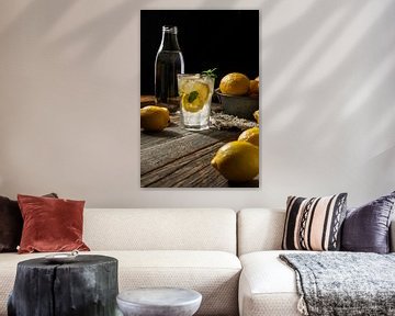 Lemonade with fresh lemons on wooden background by Olha Rohulya