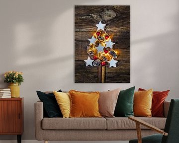 Illuminated Christmas tree decoration with ornaments, pine cones by Alex Winter