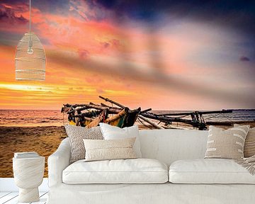 Outrigger boat on the beach at sunset in Negombo Sri Lanka by Dieter Walther