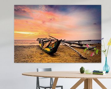 Outrigger boat on the beach at sunset in Negombo Sri Lanka by Dieter Walther