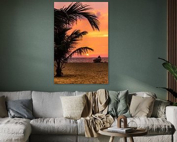 Silhouette lovers in a boat with palm tree on the beach at sunset in Negombo Sri Lanka by Dieter Walther