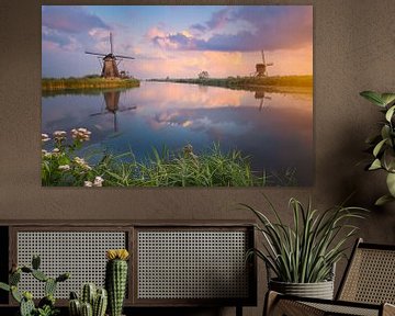 Kinderdijk windmills at sunset by Sander Poppe