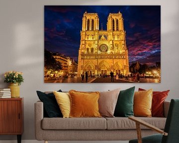 Notre Dame de Paris Cathedral on the banks of the Seine at night in Paris France by Dieter Walther