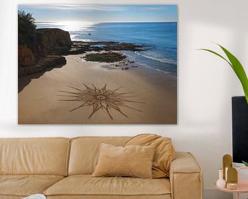 Mandala on a beach by the sea