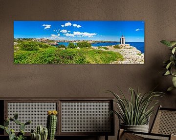 Beautiful coast view with lighthouse in Porto Cristo by Alex Winter