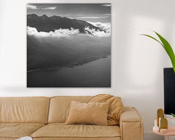 Mount Monte Baldo and town Malchesine on Lake Garda in black and white from Punta Larici
