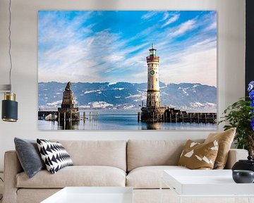 Bavarian lion and lighthouse harbour Linda at Lake Constance in Bavaria with Swiss Alps Germany by Dieter Walther
