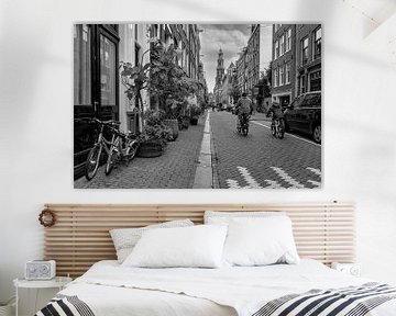 Cycling to the Westerkerk in Amsterdam by Peter Bartelings