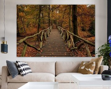 View through wooden bridge in autumn forest