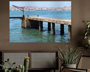 Rusty steel jetty with crane on the Tagus River in Lisbon, Portugal by Studio LE-gals