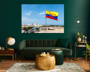 Colombian flag in the wind on the Castillo San Felipe de Barajas fortress with the city of Cartagena by WorldWidePhotoWeb