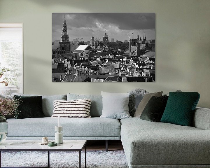 Sfeerimpressie: Over de daken van  de binnenstad van Amsterdam van Foto Amsterdam/ Peter Bartelings