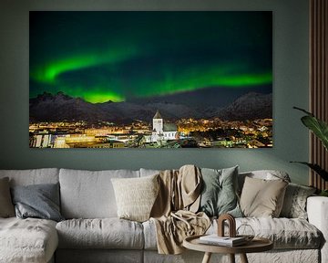 Aurora over the town of Svolvaer on the Lofoten Islands in Norway in winter with snow covered mounta by Robert Ruidl