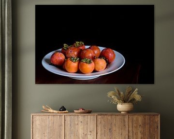 Persimmon in plate by Ulrike Leone