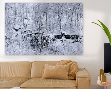 Snowy forest with small bridge over river (Senja) by Karla Leeftink