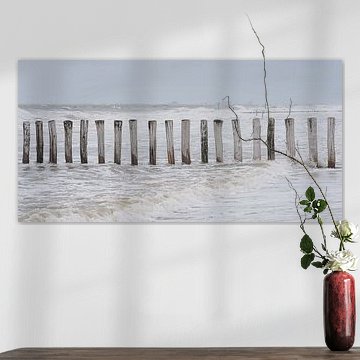 Brise-lames dans la mer et sur la plage de Cadzand sur Marjolijn van den Berg