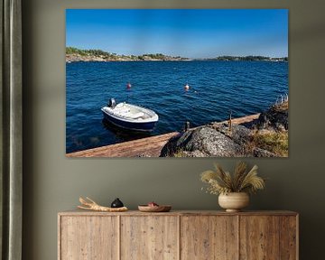 Boot und Anlegestelle in Hamborsund in Norwegen von Rico Ködder