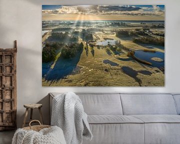 Zonsopkomst boven polder landschap Noord Holland van Menno Schaefer