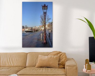 Cycling along the Amstel in Amsterdam by Peter Bartelings