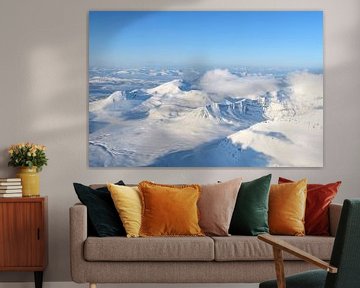 Aerial view over the snow covered mountains in Northern Norway