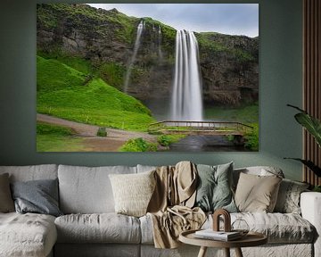 Iceland - Waterfalls of Seljalandsfoss with bridge and river and by adventure-photos