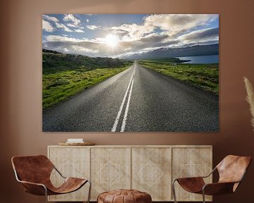 Iceland - Magic moment over straight highway between green field by adventure-photos