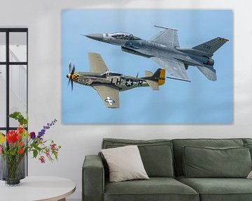 Formation of the P-51 Mustang "Baby Duck" and a Lockheed Martin F-16C Fighting Fal by Jaap van den Berg