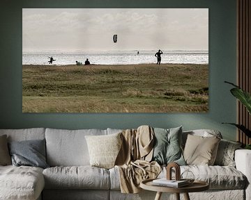 Kitesurfers with spectators on the beach of St. Peter village by Alexander Wolff