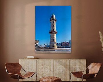 Vuurtoren aan de Oostzeekust in Warnemünde in de winter van Rico Ködder