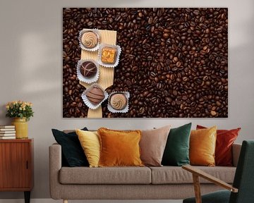 Chocolates on coffee by Ulrike Leone